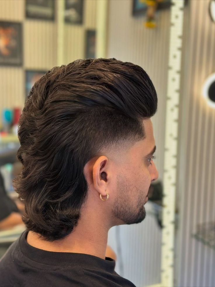 Low taper fade mullet for straight, wavy, curly, and thick hair