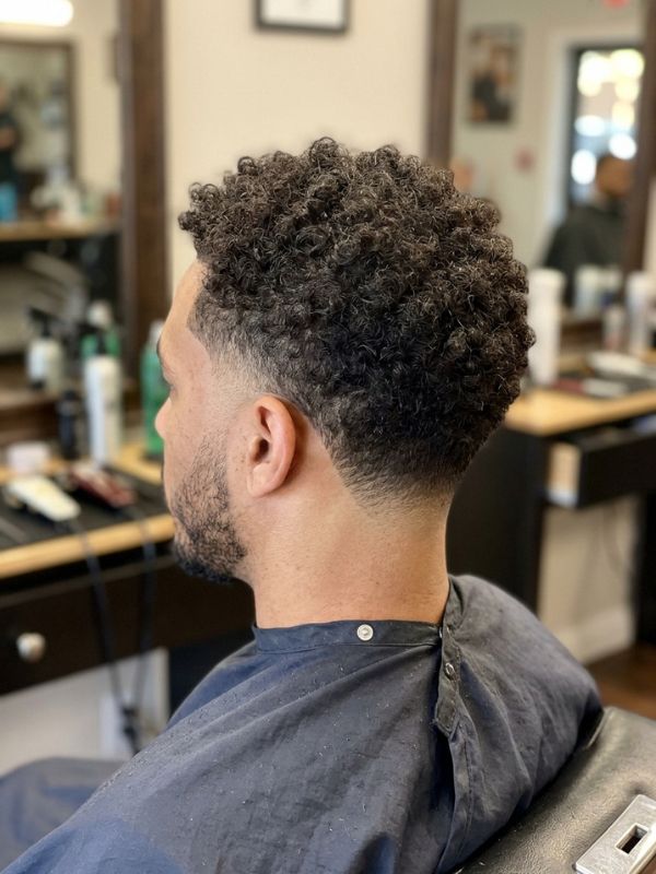 Low burst fade with a natural or tapered neckline